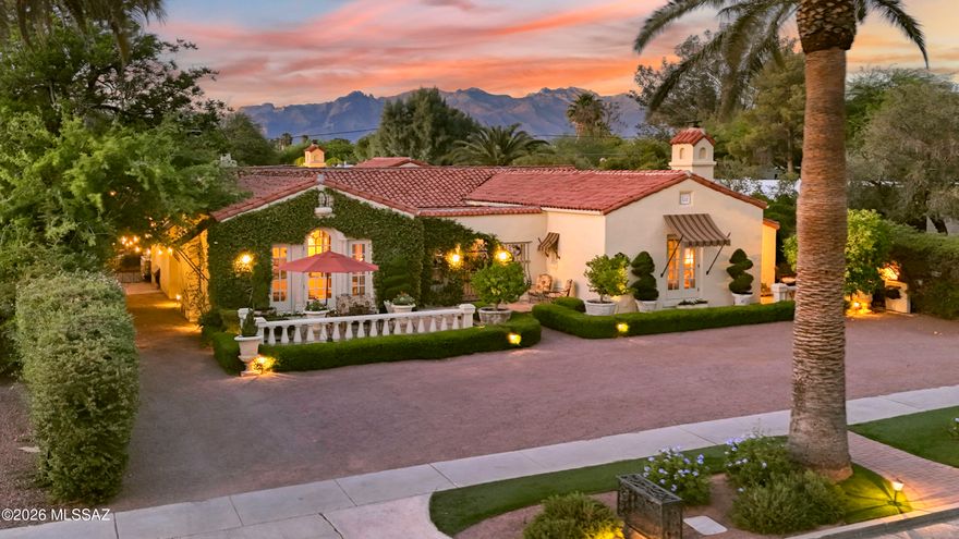 This Magnificent & Historic 1928 beautifully preserved & graciously updated home provides a truly rare opportunity to own one of Tucson's finest homes. A lovely gated, lushly landscaped front courtyard with sparkling fountain, decorative tiled wall art, gorgeous flowers & hedges, invites you into this exceptional home with 3899 sq. ft. in the main house. The spacious interior encompasses a foyer entry, an exquisite living room with 12ft. high beam ceilings with corbels, dramatic natural stone fireplace, 9 ft. High picture windows, custom draperies, large Spanish chandeliers,  French doors, gorgeous wood floors throughout, formal dining room, charming gourmet island kitchen with 13ft. high beam ceilings,  custom cabinets, limestone countertops, stainless steel appliances, continued...... .....  Viking 6 burner gas range & double ovens, Viking refrigerator, Bosch dishwasher, Viking warming drawer, Viking wine cooler, pantry, breakfast area, gas fireplace with marble mantle, cozy family room with built in cabinets, 4 bedrooms & 4.5 baths in the main house including primary suite with luxurious bath featuring marble countertops & marble floors , beautiful matching marble tiled vanities, Jetted tub, separate marble tiled steam shower & walk in closet. Additional amenities include an incredible media room with electrical retractable large projector & large movie screen, temperature controlled 700 bottle wine cellar, gorgeous Spanish chandeliers, beautiful sconces & crown molding throughout, tile roof, 3 HVAC units, 3 hot water heaters & water softener.

The stunning 777sq ft. guest house features a large living area with fireplace, kitchenette with microwave, sink, small refrigerator, bedroom & bath with shower, Saltillo tile floors, & French doors to the backyard. Enjoy the resort like backyard with gas heated pebble tec pool & spa, fireplace, lush landscaping & incredible foliage, 5 citrus trees, artificial turf, lovely fountain, outdoor Kitchen with barbecue, oven, refrigerator, basement & circular driveway. Some furniture can be included in purchase price. Move right in & be part of Tucson History. 

For your enjoyment, The following is a list of all the previous owners since 1928 & some personal information about each of them.
 
          
1919 EAST 3RD STREET
Built 1928.  Spanish Colonial Revival style influenced by the 1916 Panama-California Exposition in Balboa Park, San Diego, California
A Chronology of Residents:
1928-1933 Ferdinand and Elizabeth Biston (retired) and daughter Ramona
1934 Joseph Boyd Moss and Ramona Butz Biston Moss 
*Ramona was a very active member of the Sigma Phi sorority at the University of Arizona and served as Treasurer
1935-1936 Home vacant and listed for sale
1937 Mrs. T L Daily (tenant)
1938-1948 Jaqueline "Jack" Smith Holliday and Florence Baker Holliday
*Iron and Steel magnates from Hammond, Indiana and Winter residents. An early 20th Century "Power Couple" whose winter visits would set off Tucson's "Social Season".  Jack and Florence Holliday were so influential that U. S. President Herbert Hoover would invite them to visit him in the White House and every winter in Tucson their arrival would be announced in the Arizona Daily Star newspaper.
1948-1961 Mrs. Sharlot Avery Swem 
*Supreme Officer of the International Order of Job's Daughters and President of the Methodist Church, who was mentioned more times in the Arizona Daily Star than any other of our home's owners.
1962-1963 Home vacant. Listed owner,  Kenneth Myers
*The house was being remodeled during this period
1964-1966 Warren J. and Cora M. King  (retired)     
1967 Robert Shearer (main house) John Paquin (guest house)-tenants
1968-1979 Alfred H. and Ann Rambow
*Alfred had been a U. S. Naval officer during World War II, and later a TUSD teacher and President of the local Central YMCA ,  Ann would become Membership Chairman of the American Association of University Women and active in local philanthropic work.
1980-1990 Stephen A. and Rebekah Chapman
*Stephen owned local business Chapman Steel manufacturing and Rebekah was a successful local realtor.  The Chapmans did extensive remodeling on the house, including the kitchen.
1990-2002 Kay Duda
*Kay installed the swimming pool.  She primarily bought the home so that her children could live here while attending the U of A.  She only lived here briefly herself.  Aside from our family, Kay Duda owned our home longer than anyone else over the past 98 years.
2002-Current The Mike and Ilene Pavon family
*After 24 wonderful years caring for our home and raising our triplet children here we are ready to invite another family to become part of our home's history.
2026-?... Are you ready to become part of history?