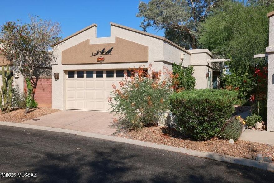1,439 SQ FT! 3 bedroom, 2 bath home in Tucson's Tucson National Townhomes West III neighborhood. Desirable two-story floor plan with spacious living areas--perfect for entertaining! Neutral carpet and tile flooring in all the right places.

Charming kitchen with included appliances: Dishwasher, Microwave, Oven, and Refrigerator.

Washer and Dryer included!

Primary suite features a walk-in closet, and this home offers 3 nicely sized bedrooms. Enjoy a private backyard with a fenced yard and covered patio--ideal for relaxing or entertaining. 2 car garage!

Located in the desirable Tucson National Townhomes West III community with access to a community pool, playgrounds, and biking/walking trails. Great Tucson location with nearby schools, parks, dining, and entertainment!