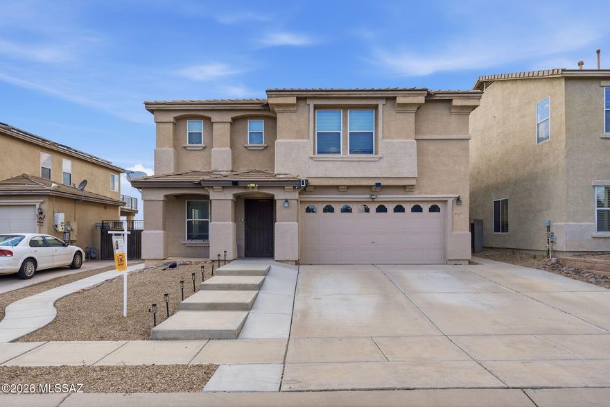 Welcome to this beautifully maintained 4-bedroom, 3-bathroom home offering comfort, space, and scenic views. Featuring two newer HVAC units, this property ensures year-round efficiency and peace of mind. The home boasts tile flooring throughout the first floor, while the upstairs is finished with brand-new carpet for a fresh and inviting feel. The home is equipped with a new water heater, adding to the home's list of thoughtful updates. Step outside to enjoy a private backyard complete with an oversized patio-perfect for entertaining or relaxing. With the wash directly behind the home, you'll enjoy added privacy along with stunning natural views. This home combines modern updates with a desirable layout and tranquil outdoor space-an exceptional opportunity you don't want to miss.