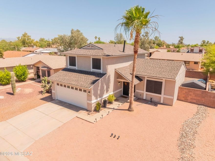 Beautifully remodeled home just a short walk to the neighborhood park! This move in ready property features stylish wood look flooring thru out the main living areas, stunning kitchen with quartz countertops, tile backsplash, stainless steel appliances, gas range, and a farmhouse sink. Newer PEX plumbing, no poly here! Convenient powder room downstairs is ideal for guests, while both the primary and guest bathrooms offer double vanities for added comfort and functionality.  Low maintenance backyard to enjoy Arizona living complete with turf and a raised garden bed. Bring those sunflowers to life! Perfect yard for relaxing, entertaining, or gardening. Thoughtfully updated and move in ready, this home offers the perfect blend of style, function and location.