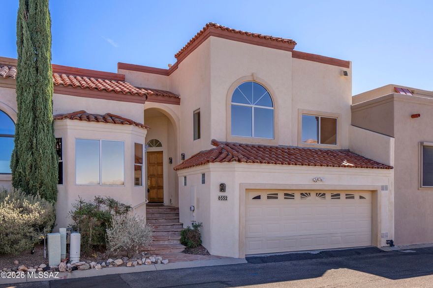 Located in the guard-gated Skyline Country Club community in the Catalina Foothills, this 2,687 sq ft multi-story townhome offers a wonderful opportunity to create your ideal luxury retreat. The home features two primary suites--one on the first floor & another on the upper level--along w/ a guest bedroom & adjacent flex space perfect for an office, den, or sitting area. The spacious kitchen offers abundant cabinetry & great functionality. An inviting great room w/ soaring ceilings and a cozy fireplace. Enjoy low-maintenance outdoor living right on the fairway w/ stunning mountain views. Additional highlights include a two-car garage &, dedicated laundry room. The ease of townhome living in one of Tucson's most desirable communities.  Tremendous potential in an exceptional location!