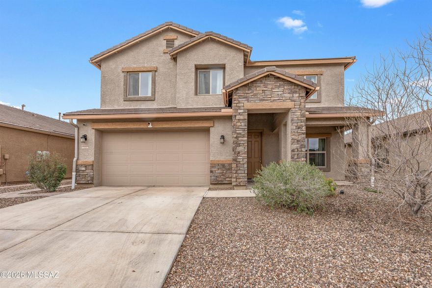 Look no further! Solar will be paid off w/ right offer! This gorgeous 4 bed, 3 bath residence in Saguaro Bloom is the one for you! Featuring a gorgeous facade w/stone accents, an easy-care landscape, and a 3 car garage. Inside you will find sizeable dining & living areas w/wood-look tile flooring and neutral palette throughout. The fabulous kitchen is worthy of a chef, comprised of wood cabinetry w/crown moulding, granite counters, SS appliances, recessed lighting, and a prep island. Continue upstairs and into the cozy loft w/soft carpet, where you can spend a relaxing Sunday afternoon. The primary suite showcases a private sitting room, a private bath w/dual sinks, and a walk-in closet for all your belongings. Lastly, the charming backyard includes a covered patio, paver seating area, and artificial turf! Hurry, act now