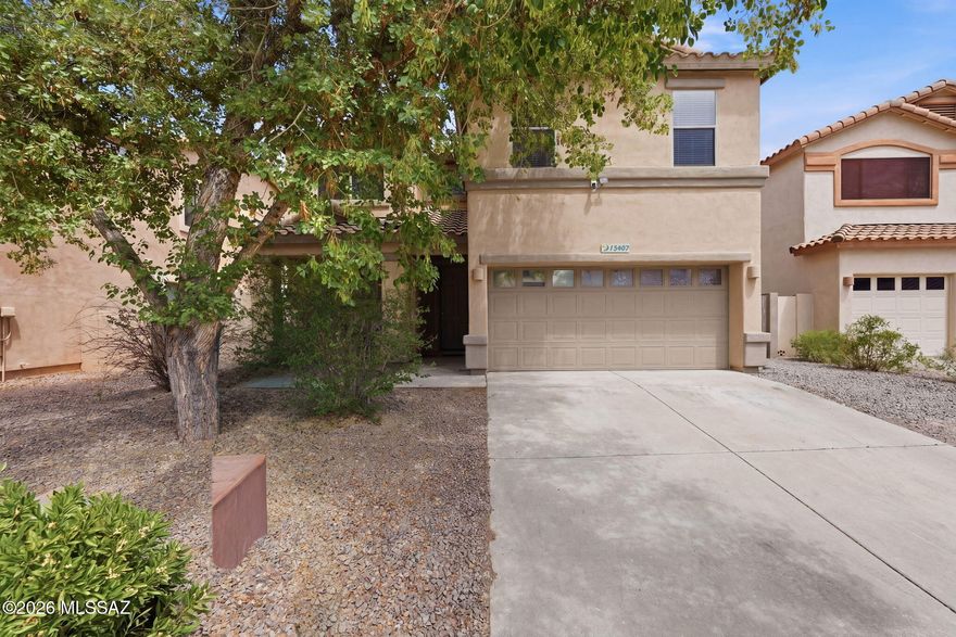 Located in a desirable gated community in Rancho Sahuarita and across the street from the neighborhood lake, this move-in ready 4-bedroom, 2.5-bath home offers space, functionality, and scenic surroundings. Fresh interior paint and recent cosmetic updates enhance the home's appeal, and all appliances ----------------------------and roof are less than six months old.

The main level features a covered front porch, formal living and dining rooms, an updated kitchen with custom granite countertops and stainless steel appliances, a breakfast nook, and a spacious family room with a gas fireplace. A convenient half-bath, along with a laundry room, completes the first floor. Upstairs, the oversized owner's suite includes a deluxe en-suite bath and a large walk-in closet. Three additional bedrooms, a full guest bath, and a versatile loft provide ample living space. The backyard is generously sized with mature landscaping, offering a private outdoor retreat. Conveniently located near the community center and amenities.