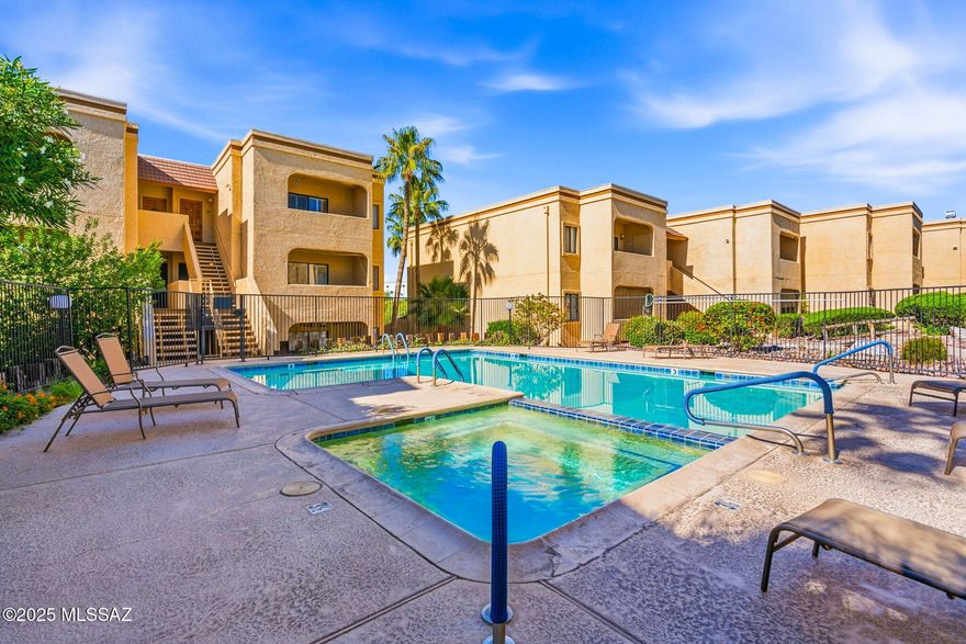 Discover effortless living in this beautifully updated, first-floor corner unit condo, where light floods every room for a bright, open, and inviting atmosphere. Perfectly positioned in the prestigious Catalina Foothills, this home offers unparalleled convenience and comfort, blending modern upgrades with a resort-like lifestyle. Imagine unwinding just steps from the sparkling community pool and hot tub, or hosting friends for a barbecue using the gas grill right across the walkway. Your dedicated covered parking spot is mere steps away, making daily life a breeze with no stairs to climb. Secure, gated access ensures peace of mind, while the central location puts Tucson's best dining, shopping, and outdoor adventures at your fingertips.
