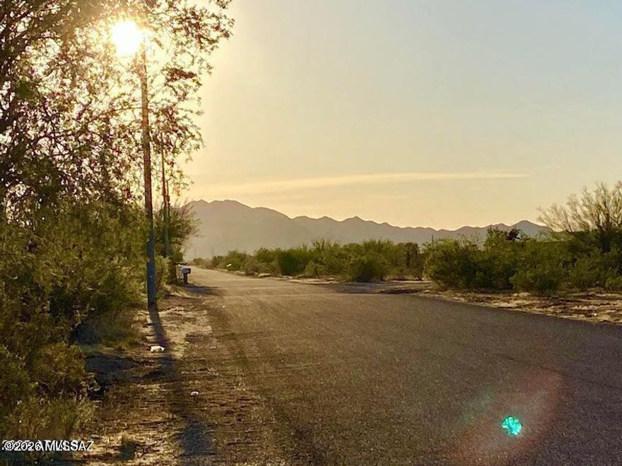 Fantastic, level lot surrounded by mountain views and power at the paved street. Zoned GR, you can build, place a manufactured home, have horses, and live freely and privately with no HOA or CC&R's. Adjacent acreage available. SELLER FINANCING AVAILABLE.