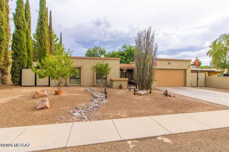 Gorgeous 3bd 2ba home with fenced yard and 2 car garage. The kitchen features stainless steel appliances, updated sleek granite countertops, ample storage & a convenient breakfast bar. Tile & wood laminate throughout. Fantastic Full Length Covered Patio W/Fans. Great For Outdoor Living. 1 Of Largest Backyards In Subdivision.N/S Exposure. Come,See,Stay!!!