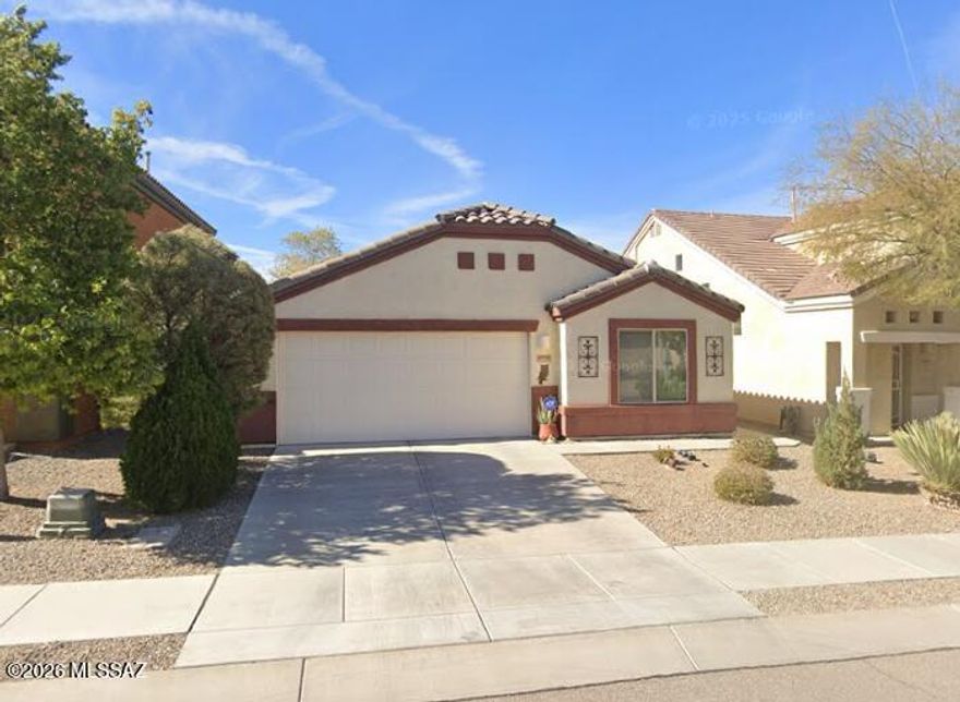 This spacious 1,598 square foot single-story home features 4 bedrooms and 2 bathrooms with an open and functional floor plan. The kitchen comes equipped with modern appliances including a dishwasher, microwave, oven, and refrigerator, providing everything needed for daily living. The living room offers a comfortable gathering space with ceiling fans for year-round comfort and natural airflow throughout the home. Each bedroom includes walk-in closets for ample storage, while the primary suite provides a private retreat with convenient access to one of the full bathrooms. The secondary bedrooms share the guest bathroom, creating a practical layout for families or roommates. The in-unit laundry room includes both washer and dryer, making household tasks convenient and efficient. A 2-car garage with garage door opener provides secure parking and additional storage space, while covered parking ensures protection from the elements. The fully fenced yard offers privacy and outdoor space for relaxation or entertaining. Built in 2012, this well-maintained property features a combination of carpet and tile flooring throughout, along with central air conditioning to keep the home comfortable during Arizona's warm seasons. Located in the desirable Interstate 10 and Kolb Road area of Tucson, residents enjoy convenient access to major transportation routes, shopping centers, dining options, and local amenities.