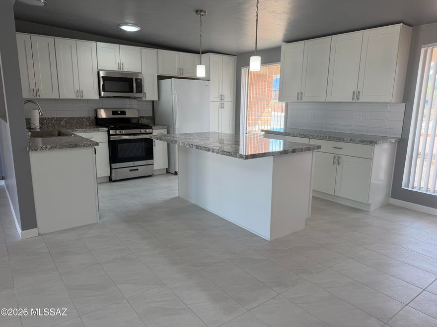 Welcome to this beautifully remodeled 4-bedroom home located on the desirable east side! Nestled in a quiet cul-de-sac, this property offers the perfect blend of comfort, style, and privacy. NEW FENCE in bk yard.
Step inside to discover a completely remodeled interior featuring a bright and airy open floor plan--ideal for both everyday living and entertaining. The spacious layout flows seamlessly from room to room, creating a modern and inviting atmosphere. Some new double-pane windows enhance energy efficiency while allowing plenty of natural light to fill the home. There is about 350 sq ft added to home Not included In assessor sq ft  laundry room is new. Area in front of kitchen & laundry rm & 4th bedroom is about 400 more sq ft that is not included in assessor. 
 Outside, you'll find a large backyard with stunning mountain views--perfect for relaxing evenings, weekend gatherings, or creating your dream outdoor oasis. Situated in a peaceful cul-de-sac, this home offers minimal traffic and added privacy.