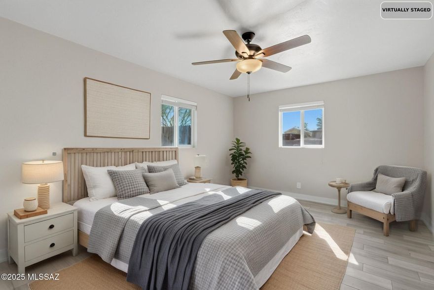 Move-in ready 4BD/3BA home in desirable San Fernando Village with approx. 2,100 SF! Features TWO primary suites--great for multigenerational living. Updated galley kitchen with granite countertops, backsplash, SS appliances & newer cabinetry. Main suite includes large closet, newer vanity & custom-tiled walk-in shower. Wood-look tile flooring in living areas, recessed lighting, ceiling fans, dual-pane windows, new doors & fresh interior/exterior paint. Save monthly with solar energy. Spacious laundry room off activity room/office. Large private yard plus a north-facing front patio--perfect for relaxing evenings. A must-see!
