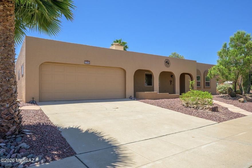 Within this partially furnished home you will find a completely remodeled interior. The front door opens to a great room showcasing a gas beehive fireplace. Its desert tan walls, textured ceiling (no popcorn), tile floors, recessed lighting and newer vinyl replacement windows continue throughout this enhanced home. The solar dome in the kitchen (1 of 3 in the home) illuminates stainless steel appliances, a breakfast bar boasting tile counters and a stylish subway tile backsplash. The kitchen window frames a beautifully landscaped, absolutely private backyard, easily accessible from the Arizona room. A separate den offers a quiet, secluded setting for reading, painting, sewing or in-home office. The totality of this renovation becomes so evident as the tour leads down the hallway to sparkling bathrooms. First, before entering, notice new interior doors and hardware. Then admire the spacious tile walk-in showers, executive height vanities, contemporary glass vessel sinks and backsplash, modern lighting and plumbing fixtures. Nothing within this home has been overlooked. Discover a sturdy, well-constructed exterior featuring quality interior upgrades.