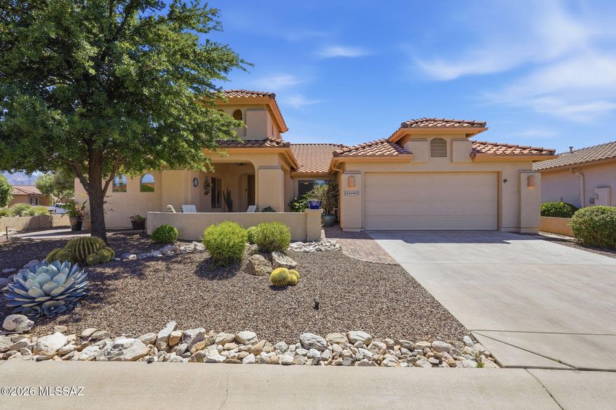 Perched on a premium, corner lot with breathtaking views of the Santa Catalina Mountains, this charming (2BD/2BA/2,181sqft) Silverton model offers the quintessential SaddleBrooke, 55+ active adult lifestyle! From the manicured desert curb appeal to the light-filled interior, every inch of this home has been designed to maximize comfort and the stunning natural beauty of the high desert. Step inside to find a warm and inviting floor plan featuring a spacious Great Room with vaulted ceilings and large windows that frame the mountain peaks like living art. The kitchen is a chef's delight, boasting updated cabinetry, sleek countertops, and a cozy breakfast nook where you can watch the sunrise over the Catalinas with your morning coffee. The primary suite serves as a tranquil retreat, offering a large bay window, dual-vanities, and a generous walk-in closet. The versatile den provides the perfect space for a home office, hobby room, or guest overflow. Outdoor living is where this home truly shines. The extended covered patio is your front-row seat to Tucson's colorful sunsets and the dramatic glow of the mountains. With a low-maintenance backyard, you'll enjoy total privacy and frequent visits from local wildlife. Located just minutes from the clubhouse, fitness centers, and golf, this home is ready for you to start living the dream on day one!