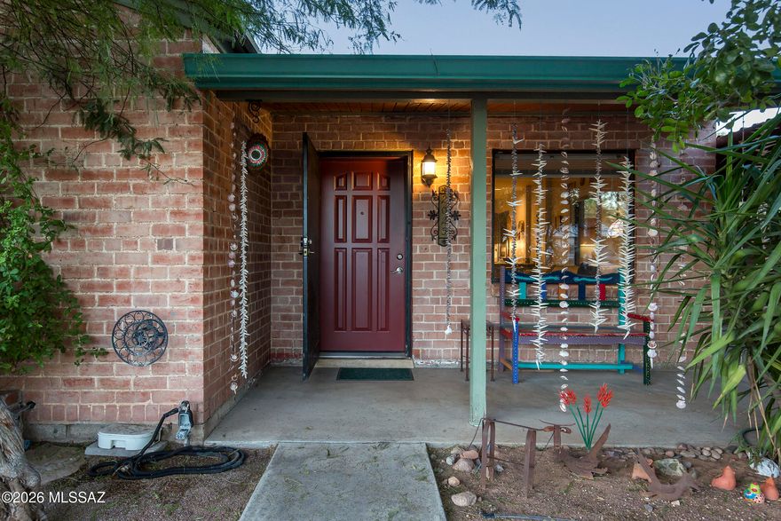 There is just something about this sweet bungalow that instantly makes you smile. This adorable 3 bedroom, 2 bath red brick home perfectly blends charm, comfort, and updates, all in a location that is hard to beat. Close to the UofA, Banner Medical Center, downtown, Campbell Corridor, and I-10, everything you need is right at your fingertips.
Inside, you will find a thoughtfully updated kitchen and bathrooms that feel fresh and inviting. Concrete overlay flooring runs throughout the home, with beautiful hardwood flooring in the primary bedroom adding just the right touch of warmth.
The outdoor space offers flexibility and function, whether you love sustainable living, road trips, or simply having extra room. Three water catchment systems are already in place, RV hookup is ready to go. There is plenty of storage for all your gear, hobbies, or toys.
Comfortable, updated, and full of personality, this home is truly move-in ready. It is one of those places you just have to see in person.