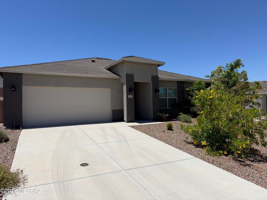 Almost new, 2023 home with 3 bedroom and 2 bathrooms. Beautifully maintained home with wood look tile, white cabinetry and quartz counter tops. Designer touches throughout home including stylish fixtures. Nicely landscaped front yard with large open backyard waiting for your personal touches. Agent/Owner