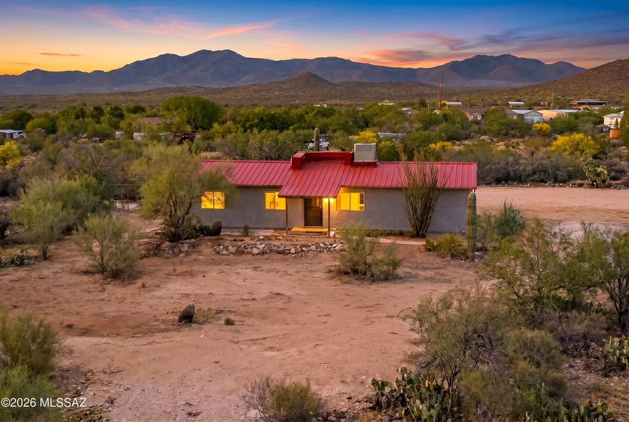 Saddle up for a fresh start at this fully reimagined desert homestead where rugged ranch life meets brand-new everything. Set on wide-open acreage with jaw-dropping mountain views, this property has been completely remodeled from top to bottom. It features a new metal roof, fresh stucco, updated flooring, modern appliances, your own private well & more, giving you the feel of a new home with the soul of the Southwest. Step inside to a clean, comfortable interior designed for easy living after long days under the Arizona sky. Every detail has been thoughtfully upgraded, creating a move-in-ready space that's equal parts practical & inviting. Outdoors is where this property really shines. A round corral/pen and tack room are ready for your horses or hobby livestock, making it perfect for those craving that authentic ranch lifestyle. With plenty of room to roam, ride & breathe, you'll find freedom in every direction.
Whether you're chasing sunsets, raising animals, or just looking to unplug & unwind, this property delivers that true Western spirit, wide open, hard to beat & ready for your next chapter! Investment property, 3 contiguous approved lots with Ranch House and Tack Room and Corral on 2 1/2 acres. Shared well for all 3 lots and electricity is on pole at property line. The two additional parcels are 1.25 acres. All defined and approved building lots by Pinal County. Could become a family compound.