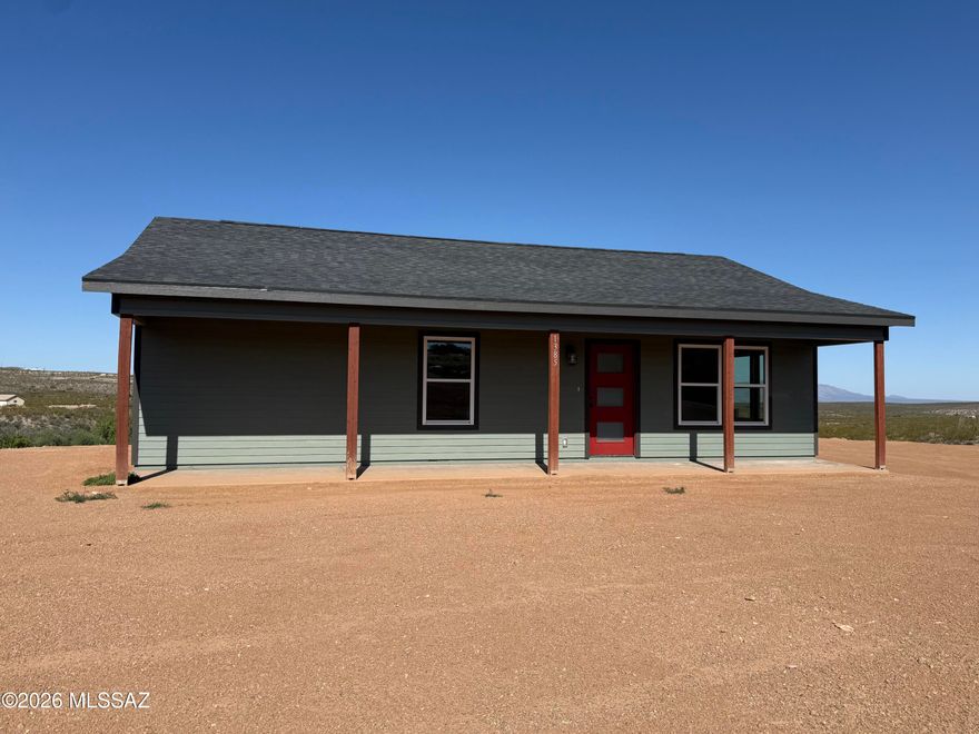 Brand new build in the old west! Come check out this new build in the Town Too Tough to Die, just minutes away from the action of Allen st. This home sits upon a stunning view lot that looks over the valley below and surrounding mountains. This home was built with top notch materials and quality craftsmanship. Step inside this home and notice the high 9' ceilings, butcher block breakfast bar and granite counter tops. Kitchen is bright and airy with all of the essentials. Master bedroom is large and has a sliding glass door out to the stamped concrete covered patio. Master bath has dual vanity with large tiled, walk in shower. Walk in closet is spacious and bright with room for all of your apparel. Laundry area inside which is well lit and has top cupboards for your supplies. Guest bedroom is spacious and bright with large closet and heated with its own mini split for heating and cooling. Guest bath is open with tiled shower and glass doors. This home is heated and cooled with high efficiency mini splits in every room. This allows the owner comfort while not having a whole house HVAC system. You can heat and cool each room independently. Floors are LVP throughout with a gray/wood coloring which makes them aesthetically pleasing and easy to maintain. LED lighting in the rooms and bathrooms, ceiling fans as well. City provided water and brand new septic systems. This is worry free living at its finest.