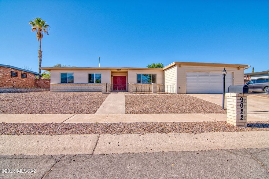 Charming, well-maintained 4-bedroom, 2-bath home in the desirable Eastern Hills subdivision! This great floor plan features a large open kitchen flowing into the great room, complete with a cozy wood-burning fireplace, making it ideal for entertaining and everyday living. The spacious owner's suite offers a private retreat, while three additional bedrooms and a large laundry room provide flexibility and plenty of storage for the whole family. Newer double-paned windows and a recently coated roof add efficiency and peace of mind. Outside, enjoy a private backyard with a covered patio perfect for dining and gatherings, plus mountain views and low-maintenance landscaping. NO HOA and minutes from schools, shopping, dining, medical, Davis-Monthan AFB, Raytheon, and Downtown Tucson.