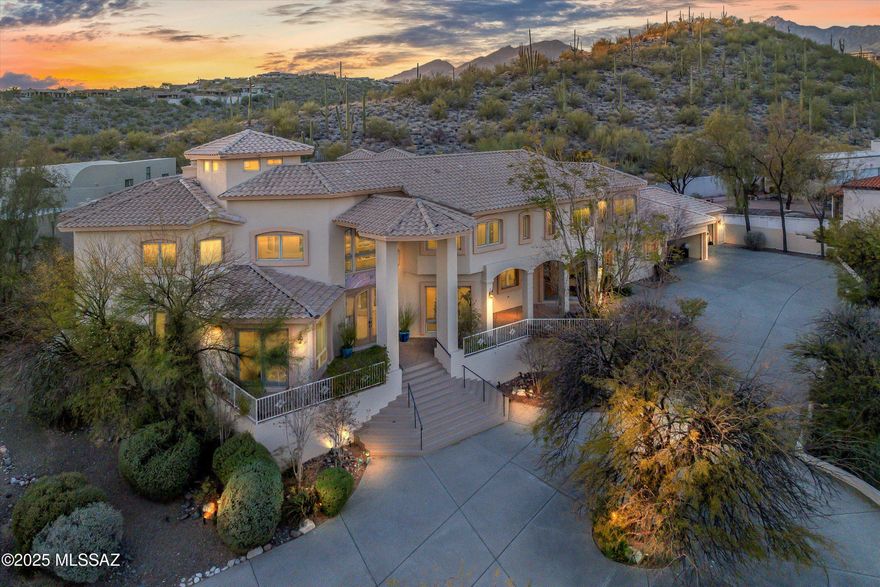 Luxury Live Auction! Bidding to start from $1,740,000.00!

On top of the hill, in prestigious Sabino Vista Hills community, this breathtaking Mediterranean-style estate, designed by renowned architect John Campisano, offers an unparalleled blend of elegance, comfort and views. Built with masonry stucco construction and custom large windows, this residence spans 7,492 square feet hosting a remodeled six bedrooms, 5 full bathrooms and a powder room, on a beautifully landscaped 0.97-acre lot. Upon entry, guests are greeted by a grand foyer with soaring ceilings and looking out to the backyard oasis. Stained concrete, wood and tile flooring throughout leading into a formal living room with one of three fireplaces with mountain and city views. Owner/Agent
