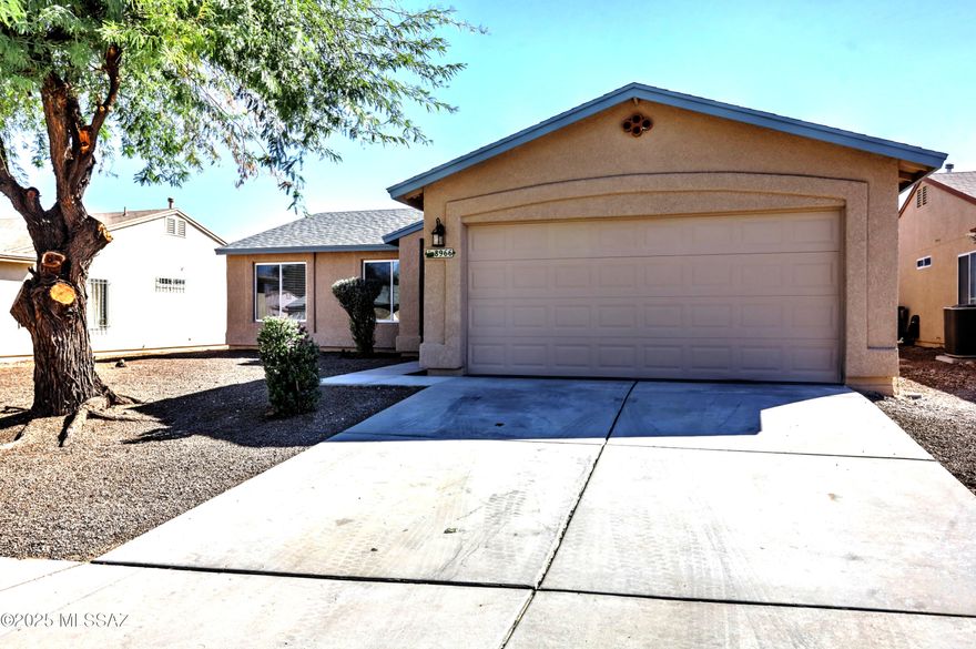Welcome home to this beautifully updated 3-bedroom, 2-bath gem offering 1,372 sqft of comfortable living space. Step inside to discover a bright, open layout featuring new kitchen quartz countertops, a stylish new sink and a charming bay window that creates the perfect breakfast nook. Freshly painted inside and out, this home boasts new carpet in the bedrooms, new tile in wet areas and luxury vinyl plank flooring in the living room and hallway. Both bathrooms have been updated with modern finishes and new fixtures. Enjoy updated lighting throughout, a dedicated laundry room and a 2-car garage with fresh epoxy flooring. Relax outdoors under the covered patio overlooking a spacious backyard  -a blank canvas ready for your garden or personal touch.