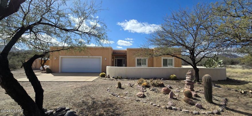 Beautiful private and well maintained home on 5 acres on Tubac's west side. The long driveway entrance gives a ranch experience. The home has 3 bedrooms, 2 full baths, a large living room that is also open to the dining area and kitchen, all with great flow. The property has beautiful landscaping and three storage buildings, one with a carport, excellent interior spaces for extra vehicles, trailers, ATV's, etc. The registered private water well has recently been updated with a new pump, wiring, etc. Solar power operates the water heater. It's a great property that feels secluded with lots of space, trails, views, room for a motorhome, and plenty of area to watch the sunrises and sunsets.