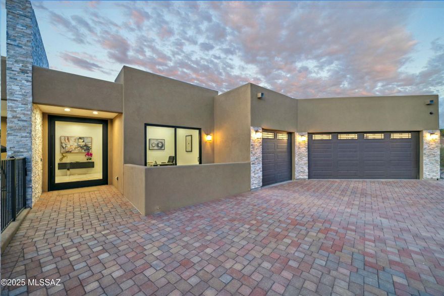 Experience modern luxury at 3861 N River Hills Dr, a newly built 3,500 sq. ft. masterpiece in Tucson, AZ. This 4-bedroom, 4.5-bath home sits on a 1-acre lot and boasts high-end finishes, breathtaking mountain views, and seamless indoor-outdoor living. The open-concept design features a gourmet kitchen with state-of-the-art appliances and stunning quartzite counters and island, while the primary suite offers a spa-like bath, custom walk-in closet, and private retreat. Entertain in style with a sparkling pool, spa, covered patio, and built-in grill area. Additional highlights include en-suite bedrooms, a home office, and a 3-car garage. Located near Tucson's best dining and recreation, this home is the epitome of elegance and comfort. Don't miss it!
