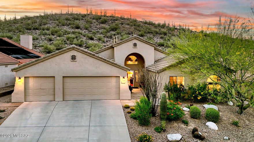 Welcome to the highly sought-after gated community of Sabino Mountain in North Tucson, where privacy, natural desert beauty, and stunning views come together. Nestled close to town yet surrounded by abundant wildlife, this beautifully remodeled and meticulously maintained 4-bedroom, 2Â½-bath home offers a rare combination of convenience and tranquility. Perfectly positioned against Sabino Mountain, the property enjoys breathtaking natural desert views, peaceful surroundings, and the unique benefit of the nearby mountain providing cooling shade and beautiful delayed sunrises.  Located in a quiet, friendly, and well-managed gated community, residents enjoy peace of mind and an exceptional quality of life. The flexible 2,302 sq. ft. floor plan features both a formal living room with dining area and a separate family room with fireplace, along with new windows in 2024.  Designed for both style and functionality, the remodeled kitchen showcases designer cabinetry, stainless steel appliances, Quartz countertops, a custom tile backsplash, gas cooktop and range, a center island with breakfast bar, inviting breakfast nook and pendant lighting.  The spacious primary suite serves as a peaceful retreat, featuring a sliding glass door that opens directly to the backyard patio for seamless indoor-outdoor living. The luxurious primary bathroom includes dual sinks, walk-in closet, a separate shower, and a relaxing jetted tub. Throughout the home, you'll find gorgeous wood flooring, newer carpet, and thoughtful updates that reflect pride of ownership. A spacious three-car garage with built-in storage cabinets provides excellent organization and functionality.  One of the home's standout features is the screened porch with a retractable screen that can be opened frequently to enjoy the fresh air, desert breezes, and serene surroundings. The wonderful rear patio offers additional possibilities for enclosed outdoor living, while the beautifully landscaped backyard is ideal for relaxing or entertaining in Tucson's stunning desert setting.  Residents of Sabino Mountain enjoy outstanding community amenities including a recreation center, year-round heated pool, spa, and clubhouse, all surrounded by the spectacular Sonoran Desert landscape while remaining conveniently close to North Tucson shopping, dining, and recreation.