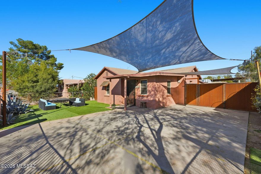 Versatile, improved property featuring a main house plus a full guest house. Both fully detached & separately metered for true flexibility & privacy, ideal for multi-generational living, rental income, or private guest quarters. Features TWO separate 3 bed/1 bath homes with private yards & separate metering. Major recent improvements completed include NEW ROOF on the main home, recoated/repaired roof on the guest home & over $12K in professional/licensed repairs for long-term peace of mind. Both homes offer updated interiors, newer appliances, improved electrical & fresh paint. Extensive custom steel corrugated fencing fully encloses the property & separates the homes into two private living spaces. Outdoor features include automatic gate, RV carport, Arizona room, raised gardens & ample.. ..parking. Located in Barrio Hollywood near downtown Tucson and the University of Arizona. Don't miss this opportunity to snag the perfect home/rental income property combo in a neighborhood that is being revitalized.