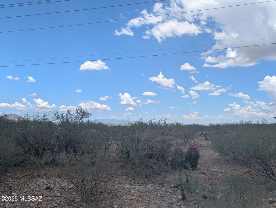 Large flat lot with mountain views is ready for development. Paved roads and utilities at the street. Just minutes from dining, shopping and schools. Buyer to verify all information deemed important to buyer.