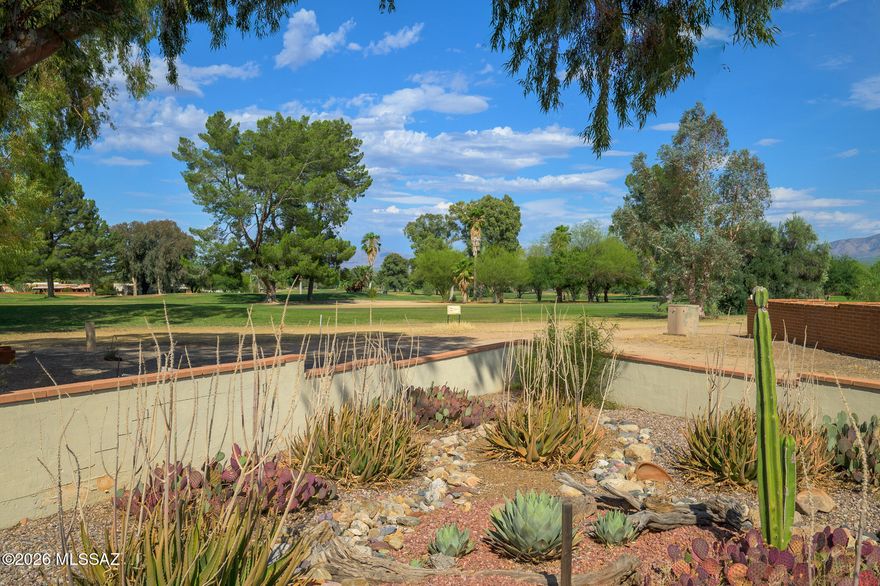 Welcome to premier living in the heart of the Arizona desert, where original Green Valley Southwest character meets modern comfort. Situated on a premium lot overlooking the Haven Golf Course and the Santa Rita Mountains, this home offers views from the kitchen, Arizona room, and back patio. Tucked away on a cul-de-sac, the property immediately stands out with tasteful desert landscaping and a charming arched front patio. Inside, you're welcomed by a spacious living room featuring a beige tile flooring that flows seamlessly throughout the home, enhancing its warm Southwest feel. This wonderfully updated home can also be purchased FURNISHED, making it truly move-in ready and checking all the boxes on your wish list. The kitchen offers a clean, timeless design with white cabinetry, laminate countertops, and sleek black appliances. Both bedrooms are generously sized with versatile layouts. The primary suite features additional built-in cabinetry for extra storage and a beautifully custom-tiled walk-in shower. Step outside to your private backyard retreat. The fenced, desert-landscaped yard is a true oasis, complete with mature landscaping and plenty of space for morning coffee, outdoor dining, or relaxing evenings under the Arizona sky. The low-maintenance setting also provides room for future customization or expansion. Additional highlights include a dedicated indoor laundry room and a 1-car carport for added convenience. The property also boasts an incredibly low HOA fee of just $60 per year. Located minutes from Green Valley Recreation East Center, you'll enjoy access to pools, fitness facilities, classes, and community events. With convenient access to I-19, Tucson, and the artistic charm of Tubac, this home offers the perfect blend of peace, privacy, and connection to everything Southern Arizona has to offer.