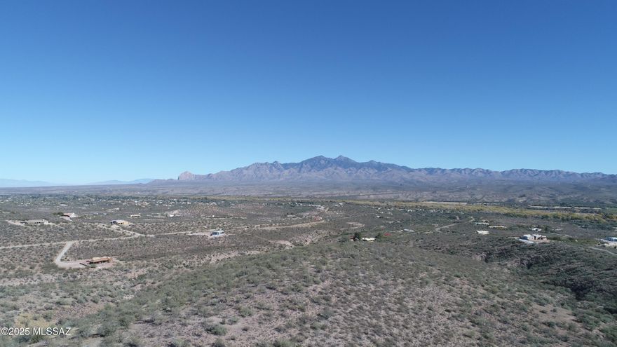 Parcel #2 is located in Tubac that is celebrated for its natural beauty and peaceful ambiance, and this exceptional property, nestled in the foothills of the Tumacacori Mountains, truly captures the very best the area has to offer. Panoramic views of multiple mountain ranges create a breathtaking backdrop, while abundant wildlife and open space provide a sense of serenity and connection to nature. This is an ideal setting to build your dream home, offering both privacy and tranquility with room to breathe. The property also presents a unique investment opportunity, as it may be split into up to five parcels with a minimum parcel size of 4.13 acres. A shared well with Parcel 1, with the water line already run to the property line, ensures reliable water access, and electric service is conveniently available at the property line as well. With multiple potential building sites to choose from, you can perfectly position your home to take full advantage of the stunning surroundings. Owner financing may be negotiable, making this an extraordinary opportunity you will not want to miss.