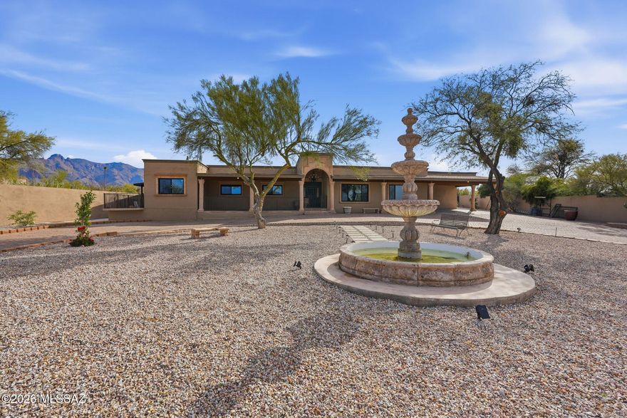 This features 3,366 square feet. Also,''

Nestled in the prestigious Catalina Foothills, this newly remodeled 7-bed, 3-bath home offers 3,366 square feet of elegant living space on a generous 0.83-acre lot. The grand entrance greets you with a charming fountain and a fully paved driveway. Out back, relax by the pool while soaking in stunning mountain views. This is more than just a home his property boasts a brand-new roof, full block fencing for added privacy, and even a private basketball court on the grounds. Convenience is key--you're just 5 minutes from Tucson Mall and 6 minutes from La Encantada. The home offers both luxury and tranquility, with plenty of space and stunning views. Don't miss this rare opportunity to gain instant equity in one of Tucson's most desirable neighborhood