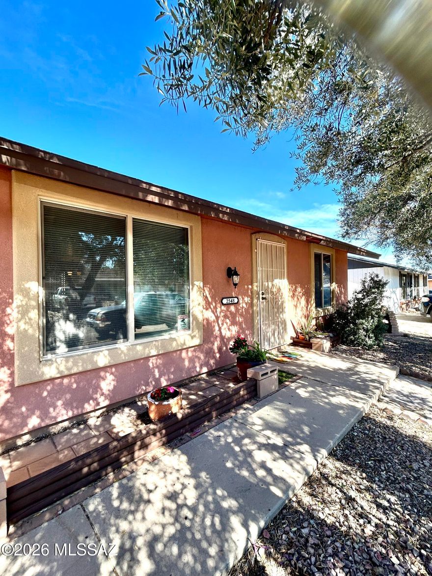 Great location in an established neighborhood. Well maintained full of upgrades 2 bedroom 1 Bath home. Spacious living room area that opens to dining area. Ceramic flooring throughout. Charming kitchen complete with almost new range and refrigerator, nice wood cabinets and granite counter tops. large laundry room next to the kitchen. Beautiful spacious private back yard surrounded with a block wall. includes a covered porch and a storage shed, nice well-built ramada/gazebo with attractive bar. For efficiency house upgraded with almost all dual-pane windows & conveniently installed solar panels (lease) also has been recently covered with thermal texturing.