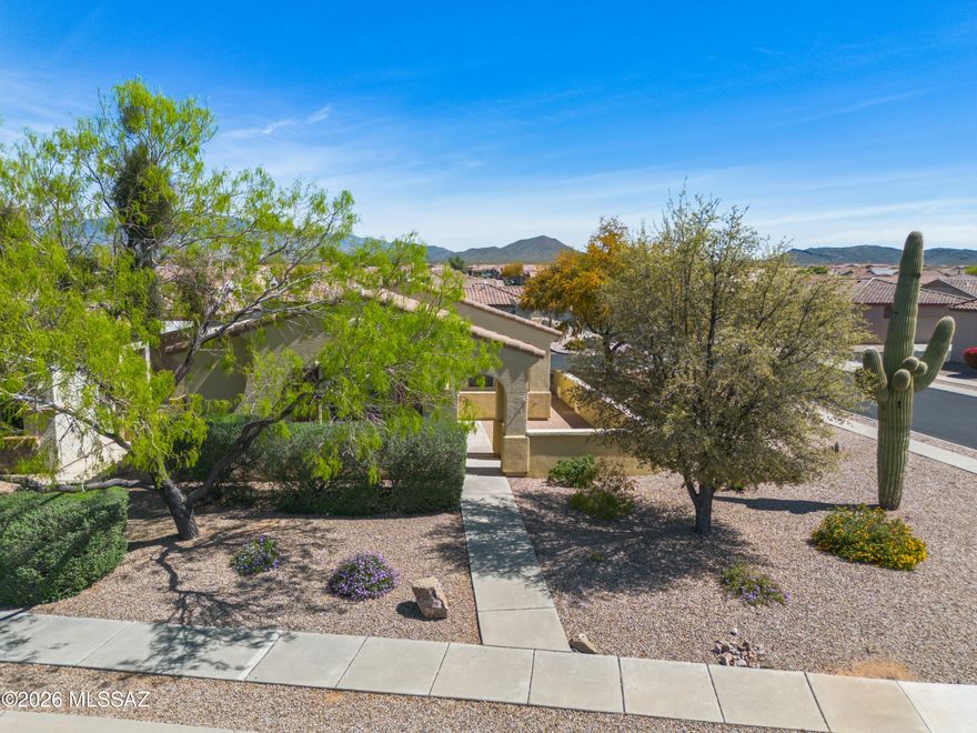 Location is everything! Located on a large corner lot w/convenient easy guest parking. This home features 2 bedrooms, 2 bath, split floor plan for privacy and separate additional den/office area. Kitchen offers Corian counter tops & white appliances giving clean seamless & trendy look. Enjoy the brightness from windows and calm neutral color palettes.  Del Webb offers full choices for daily lifestyle. Keep yourself busy w/exercise, pickleball, golf, swimming, crafts and club house amenities. Begin your morning sitting on front courtyard with coffee. Perfect home for the winter visitor or full-time sunshine enthusiast. If the Tucson Sunshine isn't enough to convince you, this beautiful 55+will seal the deal. Minutes away from Parks and shopping. Lush Common Grounds maintained by HOA.