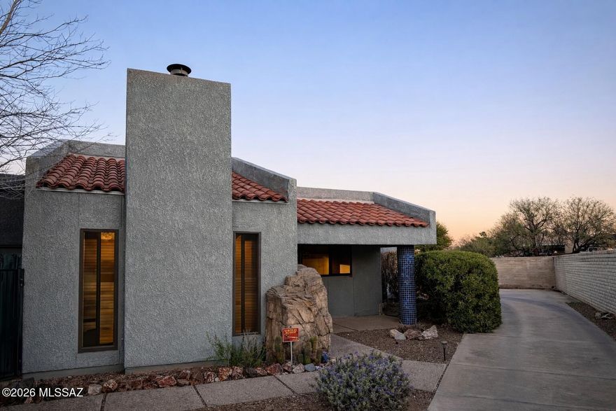 Discover a true mid-town gem at 3784 N Fox Ave, where architectural character meets an unbeatable Tucson location. This 3-bedroom, 2-bathroom home serves as a spectacular canvas that is prime for some light remodeling to your touch, offering a rare opportunity to personalize a space with incredible bones.

The interior is anchored by a serene indoor atrium featuring a natural rock waterfall formation, creating a peaceful centerpiece for the main living area. You will find beautiful beamed ceilings and a custom wood-accented den that adds a layer of warmth to the home. One of the three bedrooms also features a striking wood ceiling, making it the perfect inspiring space for a home office. The kitchen is both functional and stylish, featuring durable quartz countertops and plenty of storage space for all your culinary needs. In the primary suite, the spacious Roman bath is ready for your vision; it just needs some tile work to truly shine.

Situated on a desirable corner lot, the property features a long driveway leading to a private garage. The backyard serves as a private retreat, featuring a perfect setup with gorgeous views to enjoy while relaxing by your pool and flagstone decking.

Convenience is at the heart of this property's appeal. You are located just minutes from the University of Arizona, TMC, and the Foothills. Outdoor enthusiasts will especially love being situated right along the bike trail to the Loop path, offering miles of scenic recreation right outside your door. Set within a great community with access to a community pool, this mid-town gem is a fantastic find in a premier Tucson hub.