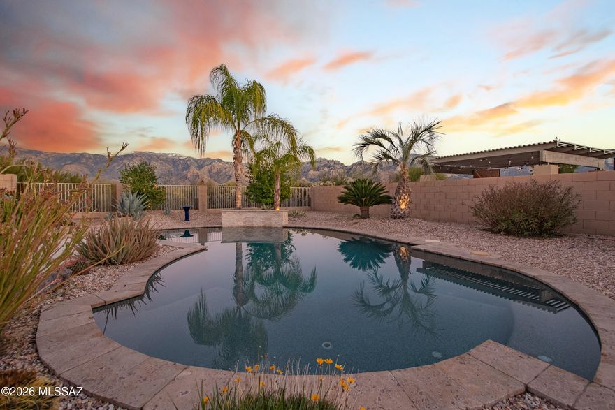 Perched to capture some of the best views in Oro Valley, this exceptional 2 bed, 2 bath home with a versatile third bonus room—perfect for guests, a den, or home office—offers a lifestyle that truly feels like living in heaven. Wake up to sweeping mountain  views that most people only see in their dreams, with unforgettable sunrises and sunsets as your daily backdrop. The interior is beautifully updated with stone flooring, quartz countertops, and  top-of-the-line stainless steel appliances, creating a refined yet comfortable living space. Best of all, the home is offered fully furnished, making it completely move-in ready. A rare opportunity to own a front-row seat to Oro Valley's most breathtaking scenery.