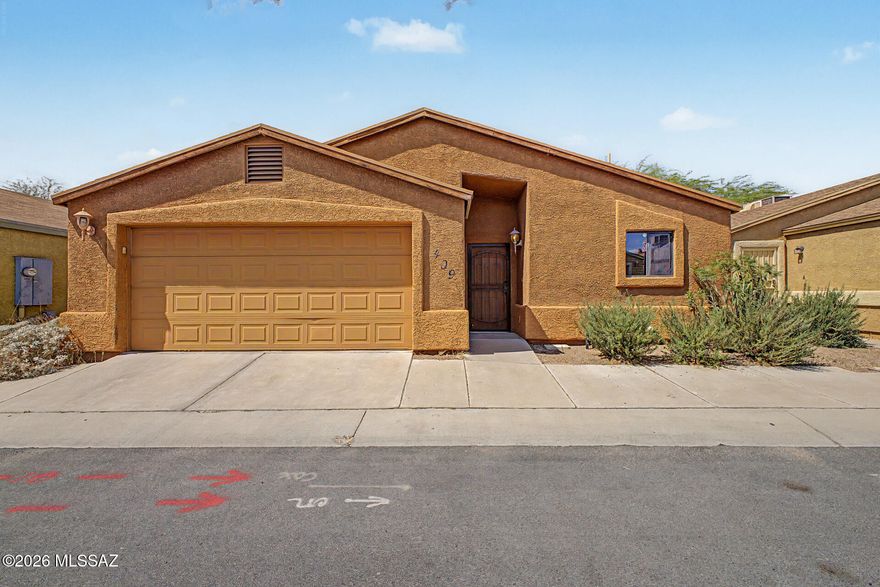 Welcome to this charming 3-bedroom home! Great curb appeal, with a manicured landscape and a 2-car garage. Inside, you will find a bright and open layout with stained concrete flooring, vaulted ceilings for an airy feel, a fireplace to add warmth, a surround sound system for fun movie nights, and an earthy palette throughout. The kitchen comes equipped with oak cabinetry, a spacious peninsula with a breakfast bar, and built-in appliances for a seamless cooking experience. Get a good rest in the main suite, complete with a private bathroom for extra comfort. Out back, you'll have a paver patio, ideal for entertaining and morning coffee, and a hot tub, perfect for relaxation! What's not to love? Make it yours now!