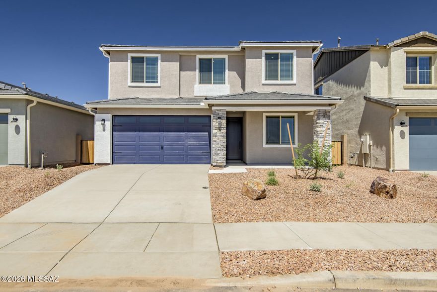Discover the Wellton by LGI Homes at Star Valley, a beautifully designed two-story home that perfectly blends space, style, and comfort. With five-bedrooms, three-and-a-half bathrooms and an open-concept layout, this home was crafted with your family's lifestyle in mind. The heart of the home features a spacious kitchen, dining area, and family room that flow effortlessly together, making everyday living and entertaining a breeze. A downstairs guest bedroom offers added flexibility, while the upstairs loft provides the perfect retreat for movie nights, playtime, or a home office. Enjoy peaceful mornings and relaxing evenings on the private back patio, all in the amenity-rich community of Star Valley.