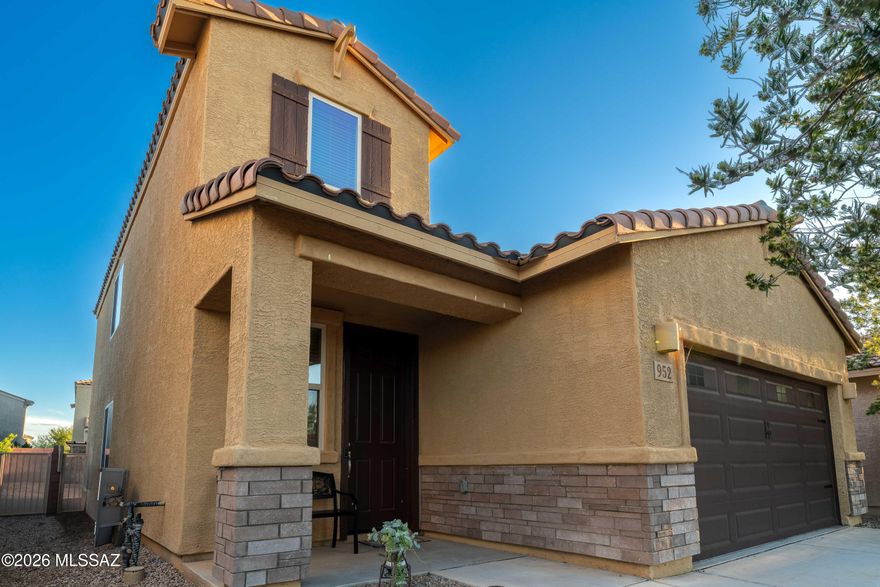 Welcome to this beautifully appointed 4-bedroom, 2.5-bath home offering 2,077 sq ft of thoughtfully designed living space. The first-floor primary suite provides a private retreat with a spacious walk-in closet, while upstairs features three additional bedrooms, a versatile loft, and full bath with tub.  Enjoy outdoor living in the backyard—ideal for barbecues and unforgettable family gatherings. Nestled in the sought-after Madera Highlands community, residents enjoy resort-style amenities including a swimming pool, sports courts, parks, and playgrounds. This exceptional home won't last at this price!  Call me today!