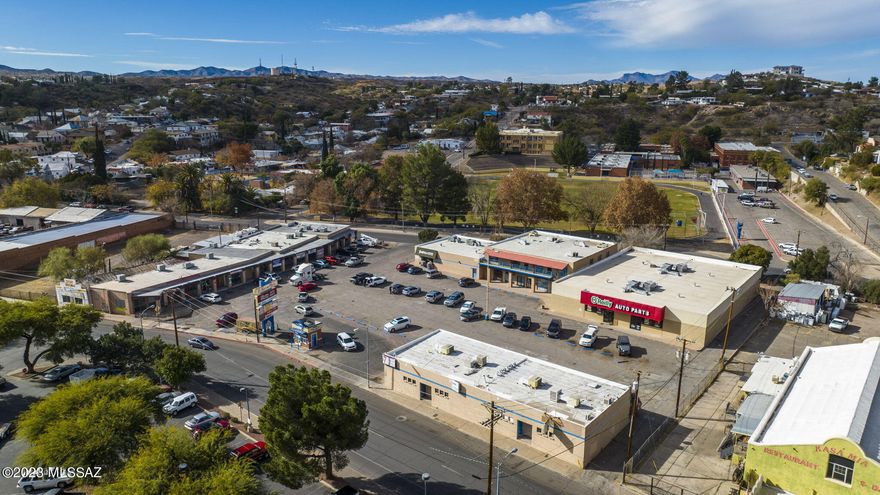 Phenomenal investment opportunity to own the coveted El Alamo Plaza, a well-established retail and office commercial center located on a huge 2.06-acre lot in the heart of downtown Nogales! Located approximately 0.45 of a mile north of the international border, the plaza can be accessed by heading south on N. Grand Avenue (on way to Mexico) or by heading north on N. Arroyo Blvd (as leave Mexico). The property comprises 21 income producing units spread out over 37,482 square feet boasting 16 retail spaces, one big box retail, three office spaces, and one stand-alone hub. Established tenants include O'Reilly Auto Parts, Buffalo Exchange, PostNet Postal Service, Anda Laundry Mat, Dorado Staffing Services, Futuro Insurance, Medicare Community Resource Center, Mining Supplies,