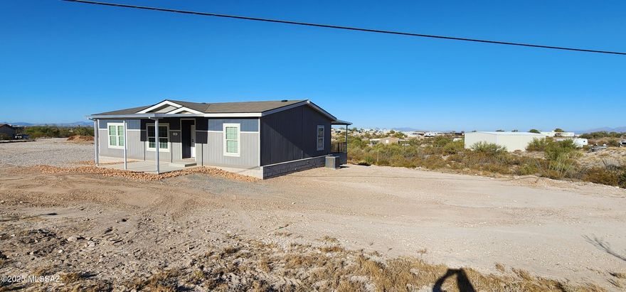 Seller financing available at 7 percent. 2021 CAVCO manufactured home, 3 beds/2 baths on an acre lot, with gorgeous views, lots of room for all your toys, horses, and more.