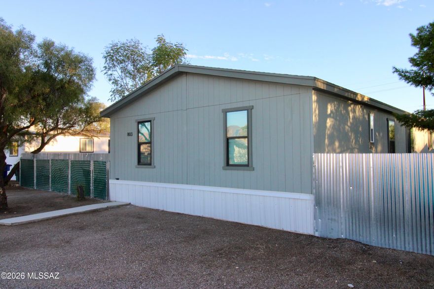 Upgraded 5-bedroom, 3-bathroom home, offering 1,792 square feet of living space in the desirable Collen subdivision. Conveniently located near I-10 and the heart of Central Tucson. Completely remodeled interior, featuring brand-new dual-pane windows for enhanced energy efficiency, and durable vinyl flooring that adds style and ease of maintenance. The kitchen has been beautifully upgraded with granite countertops, a spacious farm sink, and new stainless steel appliances. This home includes 3 spacious walk-in closets and a huge laundry room that adds to the convenience. Freshly painted inside and out. The fully fenced yard offers privacy and a perfect outdoor space for relaxation or entertaining.