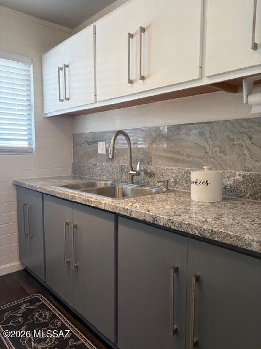 Central Tucson upstairs 1-bedroom, 1-bath co-op unit. The kitchen features new granite countertops, freshly painted cabinets, and all appliances convey. Interior updates include brand-new carpet, ceiling fans, and updated ceiling lighting. The enclosed patio has been incorporated to expand the bedroom, creating additional usable living space. This desirable end unit offers enhanced privacy with no neighboring units on any vertical side. Conveniently located near bus lines, restaurants, and shopping. Reid Park is just a few blocks away and offers a golf course, walking paths, dog park, and more. Only minutes from Downtown Tucson and the University of Arizona. Cash only. No rentals permitted.