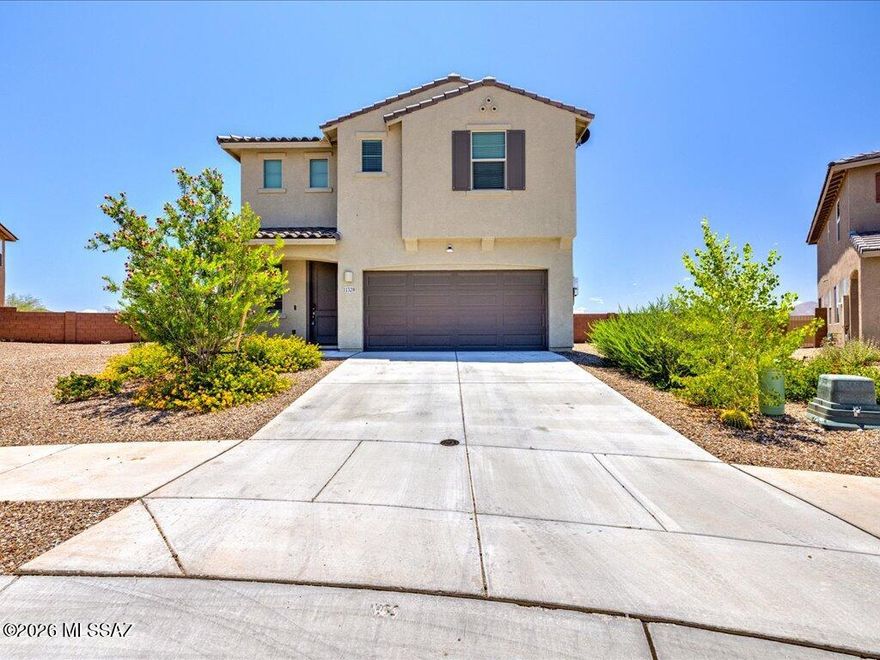 This immaculate 2023-built Meritage home offers the perfect blend of modern design and ultimate energy efficiency, complete with installed solar panels! Spanning 2,384 square feet, this property features an inviting, open-concept floor plan with 4 spacious bedrooms and 2.5 bathrooms. The kitchen flows seamlessly into the main living areas, making it ideal for daily life and entertaining. Situated on a generous 0.23-acre lot, there is ample outdoor space to create your ideal backyard retreat. Located in the highly desirable Vail School District and complete with an attached 2-car garage. Skip the new-build wait times and start enjoying lower utility bills in this pristine, move-in-ready home today!