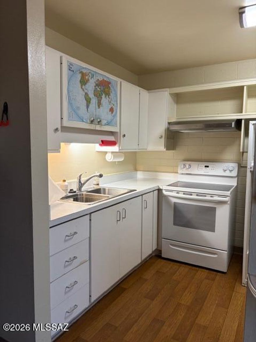 Reduced price! Eastside downstairs coop studio. All appliances stay, Mini-split for heating and cooling, laminate flooring, Ceiling fan. Plenty of storage for all your things. Bathroom has an upgraded vanity and mirrors/lights. Parking spot is right outside the back door.  Back patio slab is a great place to hang out and watch the sunrise. And has potential to be enclosed. Cash only, no rentals. Monthly fee includes: Property taxes, water, sewer, trash, gas, roof, pest, pool, parking and more. Cash only, no rentals.