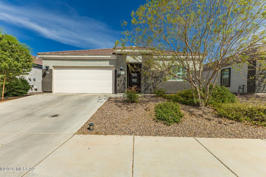 Fall in love w/ the DR Horton Kingston floor plan in the highly sought after Barnett Village, where comfort, style, and breathtaking views come together seamlessly! This beautifully maintained 4 bedroom, 2 bath home w/ a 2 car garage showcases mature landscaping and exceptional curb appeal. Step inside to a light filled interior that exudes sophistication, featuring upgraded plantation shutters, recessed lighting, and a perfect blend of tile and LVP flooring throughout. The open concept creates the perfect space for both everyday living and entertaining. The chef inspired kitchen is truly the heart of the home, complete with stainless steel appliances, quartz countertops, a spacious pantry, shaker cabinetry w/ crown molding and a large island with a breakfast bar, ideal for gatherings and casual dining. The generously sized primary suite offers an ensuite w/ dual sinks, upgraded enclosed built in linen cabinetry and a very large walk in closet. In the backyard, enjoy ultimate privacy with no neighbors behind and immaculate mountain views as your backdrop. Designed for both relaxation and entertainment, this outdoor space features a covered patio w/ a retractable sunshade for added comfort, beautifully laid pavers, artificial turf, a swim spa, and thoughtful upgrades incl. a drip irrigation system, upgraded retractable screen door and an electrical doggy door. Don't miss a chance to make this home yours!