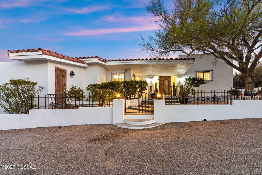Rare opportunity to own a 2,875 sq. ft. home on 1.26 acres with no HOA. This well-maintained property offers 3 bedrooms and 3 bathrooms, including two primary en-suite bedrooms and a separate guest suite--ideal for multi-generational living or added privacy.
Enjoy Catalina Mountain and Pusch Ridge views from multiple vantage points throughout the home. The open-concept kitchen connects to the dining and living areas, featuring large windows that bring in natural light and showcase the surrounding desert landscape.
Interior features include a wood-burning fireplace, a spacious great room with high cathedral ceilings, and a functional floor plan designed to maximize views. The owner's suite includes private access to an outdoor spa area for added relaxation. Recent updates include interior and exterior paint, new carpet, baseboards, a new water softener, LED recessed lighting and roof updates with warranty. Property has been well maintained and is move-in ready.

Located in a quiet, established community with limited turnover. Convenient access to Oro Valley Country Club, El Conquistador Country Club, shopping, dining, and Catalina State Park with hiking and outdoor recreation.