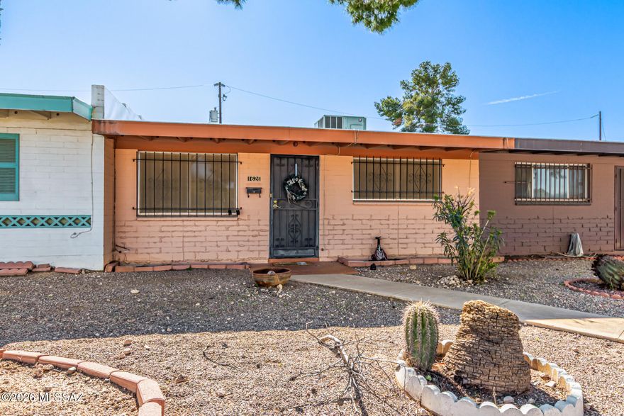 Seize the chance to own this charming townhome in a convenient location. Inside, you'll find a serene living room with vaulted ceilings, a soothing palette, and durable tile flooring. You'll also find a dedicated family room perfect for relaxing moments with loved ones. The eat-in kitchen features skylights for ample natural light, wood cabinetry, and built-in appliances for a seamless cooking experience. The bedroom is cozy and well-sized, offering a private bathroom for added comfort. Venture out onto the open patio, which includes a carport and an RV gate. Ideally located close to bus stops, restaurants, and shopping options. Don't miss out on this fantastic opportunity!