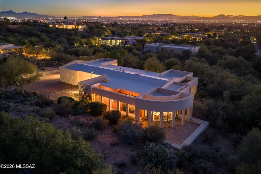 Privately situated on a 1.3-acre cul-de-sac lot within 24-hour guard-gated Skyline Country Club, this one-level, architecturally distinctive foothills residence offers sunset and up-close Catalina Mountain views in a convenient foothills location. 2-Bedroom, 2-bath plus 2-dens/offices. This lock-and-leave desert retreat is framed by mature natural desert landscaping. With a quiet cul-de-sac location adjacent to a greenbelt, the property maintains a sense of seclusion while maintaining convenient access to Tucson's best amenities. Upon arrival, you are greeted by an impressive motor court lined with pavers. The home is thoughtfully designed with generous living spaces, walls of glass, and abundant natural light, creating an airy, sophisticated feel perfect for entertaining.Continued... The interior features a split-bedroom floor plan with a spacious living room, formal dining room, powder room, and a sitting room with a curved wall of windows designed to capture the spectacular Catalina Mountain Views to the north. The floor plan includes a large primary suite, a private guest suite, an additional bedroom, and a dedicated office with custom built-ins. The spacious cook's kitchen in the heart of the home features a center island, ample cabinet storage, a gas cooktop, a stainless steel refrigerator, and a bright breakfast area with a door to a covered patio. The laundry room with a sink is adjacent to the kitchen.  Just outside is a large storage room with air conditioning and an oversized two-car garage. The property has a new main water line and water heater. Convenient Foothills location near two Whole Foods Markets, and just minutes from La Encantada's fine dining and shopping. Convenient to the University of Arizona.
The nearby "the Loop", Tucson's nationally recognized 133-mile connected bike path. Skyline Country Club offers memberships that include golf, tennis, pickleball, workout facilities, special events, and more. Just minutes from the Coronado National Forest, enjoy easy access to hiking and biking. Highly-rated Catalina Foothills District #16 schools, including Sunrise Drive Elementary school with an optional Chinese Immersion program. Close to Basis Charter School and private schools: Castlehill Country Day School, Pusch Ridge Christian Academy, The Gregory School, and Salpointe Catholic High School.