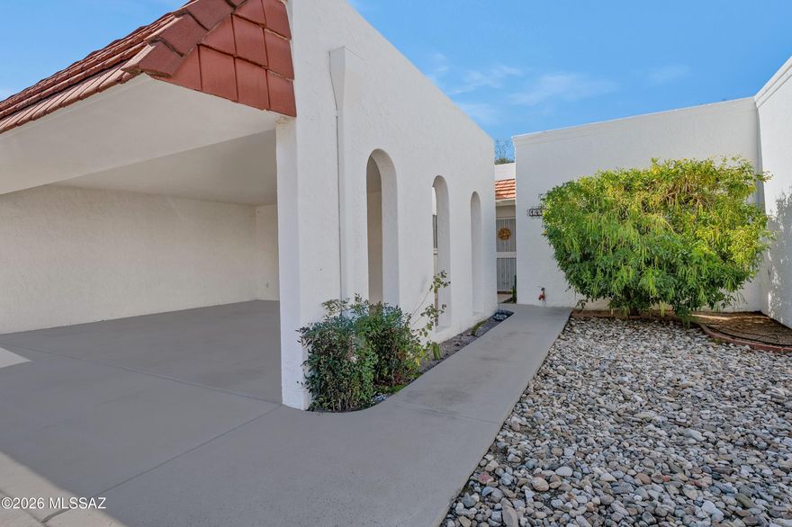Well-suited for seasonal residents, first-time buyers, or those seeking a low-maintenance full-time home, this 3-bed, 2-bath condo offers comfort, privacy, and convenience. Both bathrooms are spa like and have upgraded spa-shower faucets. The split floor plan allows flexibility and separation, while skylights fill the home with natural light. The in-unit laundry with storage adds everyday ease and convenience. Enjoy extra space in the Arizona room, perfect for hobbies or relaxation, enhanced by an orange and a grapefruit tree just outside the patio door. The rare privacy is a bonus with only one neighboring unit and no neighbors behind, and only steps from the community pool, hot tub, and guest parking. Reasonable HOA fees enhance overall affordability. SOLAR LEASE IS PAID IN FULL Ideally located near shopping, dining, parks, major medical facilities, and the University of Arizona, this home offers an easy Tucson lifestyle in a well-kept community.