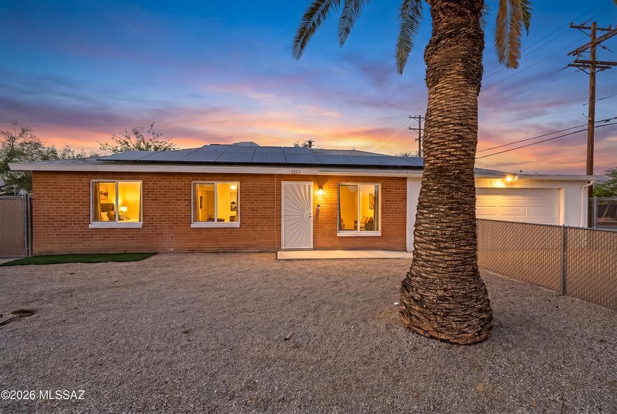 Charming updated single-story home on a corner lot with no HOA. This 3-bedroom, 1-bath residence offers comfortable living space and blends classic character with thoughtful updates. The bright living room flows into a functional kitchen. Step outside to a covered patio overlooking the fully fenced large backyard. An attached 2-car garage and convenient side gate provide ample parking options. Mature shade trees enhance both curb appeal and everyday comfort. Ideally located near David-Monthan AFB, shopping, dining, hospitals and Park Place Mall.