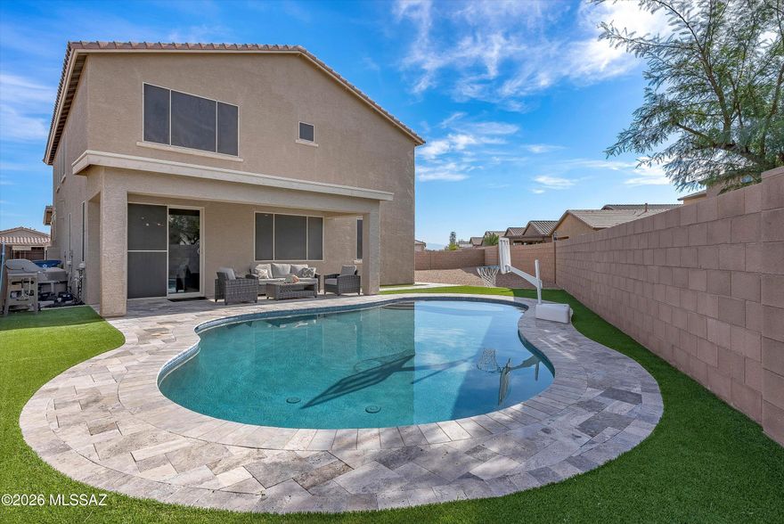 Exceptional 5 bedroom, 3.5 bath NextGen home on a 0.22 acre cul-de-sac lot in Star Valley. This 2,897 sq ft two-story features a true first-floor mother-in-law suite with private side entrance, living room, kitchenette, full bath, bedroom, and space for its own laundry. Ideal for multigenerational living or guests. Gourmet kitchen with white 42'' cabinets, granite countertops, tile backsplash, double wall ovens, gas cooktop, stainless appliances, and walk-in pantry. Dramatic 20' foyer ceilings, 8' doors downstairs, and wood-look tile flooring throughout the first floor and all upstairs wet areas. Resort-style backyard with PebbleTec pool, newer gas heater, travertine pavers, artificial turf, and covered patio. Extra long driveway and quiet cul-de-sac location. Inside, the home continues to impress with thoughtful design and functional spaces throughout. The main living areas feel open and welcoming, with upgraded lighting, ceiling fans in every room, and oversized doors on the main level. The kitchen offers generous prep and storage space, while the adjacent dining area is highlighted by upgraded lighting and connects easily to the great room for everyday living or entertaining.

Upstairs, a large loft provides flexible space for a second living area, office, or media room. The primary suite is spacious and private, featuring a large tiled walk-in shower with bench and rain shower head, dual sinks with granite countertops, and a sizable walk-in closet. Three additional bedrooms are well proportioned and share a hall bathroom with dual sinks and a separate toilet and shower area. The laundry room is conveniently located upstairs.

The guest suite maintains privacy while remaining part of the home's cohesive design, with its own living area, kitchenette, bedroom, full bath, and room for separate laundry, along with exterior access to the side yard.

Outdoors, the backyard is finished with travertine pavers, artificial turf, and a covered patio, creating a clean and low-maintenance space. The pool heater was installed within the last 15 months, and the lot layout offers flexibility for future expansion or the option to create a private outdoor area for the guest suite.

Solar screens on all windows, a tankless water heater, water softener, Car Charger, and an extra-long driveway add comfort and efficiency. Residents also enjoy access to a large community park with playground and sports courts.